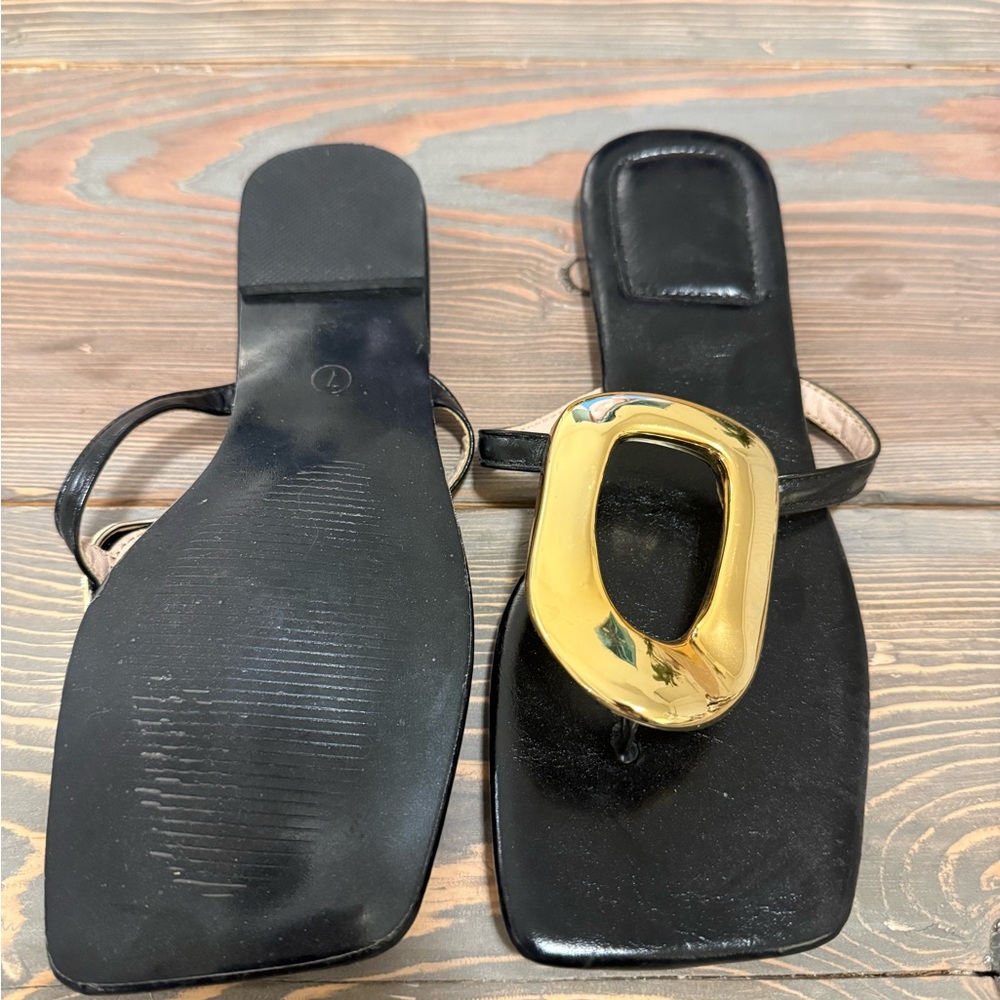 Elegant Black Sandals with Gold Accents - Picture 2 of 2